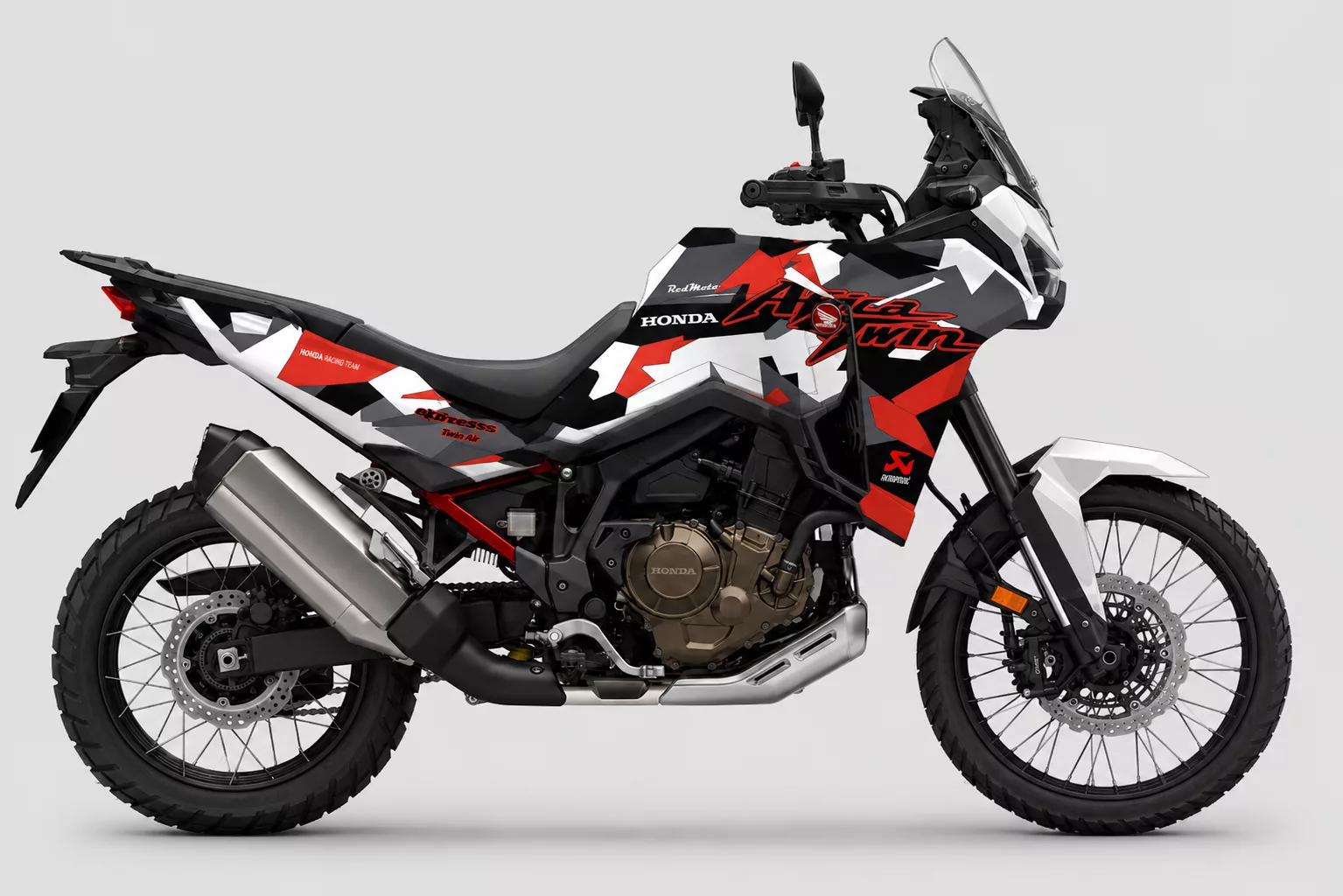 Honda Africa Twin Terra Raid Edition Kit de vinilos Honda Africa Twin Terra Raid Edition con diseño rally adventure en rojo, negro, blanco y gris instalado en moto trail